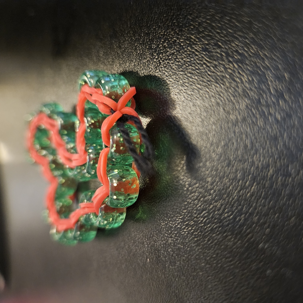 Green Beaded Bracelet with Red Accents
